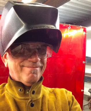 Taking a break from welding at the Crucible in Oakland