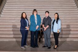 Group photo of the Animal Care and Control Team standing on the steps of the SF City Hall rotunda