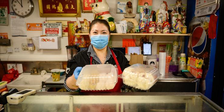 A person serving food. 