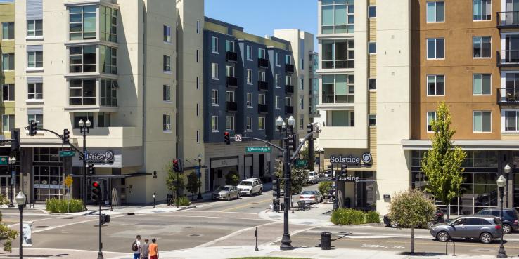Modern apartment buildings near a transit station