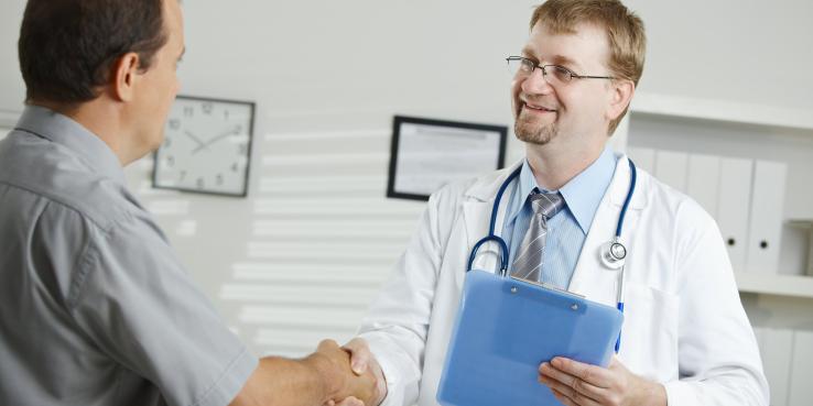 medical doctor greeting patient