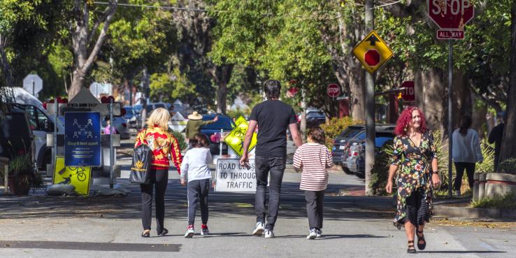 People walking on street closed to automobile access, Noe Street, San Francisco