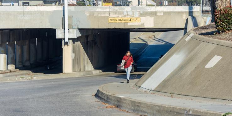 person walking down an u