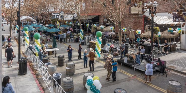 San Pedro Square, San Jose - live performance on stage with people dancing