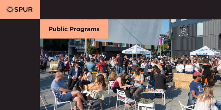 Photo of Octavia Street in an outdoor square with people and vendors (food, beverage, & retail) in the background.