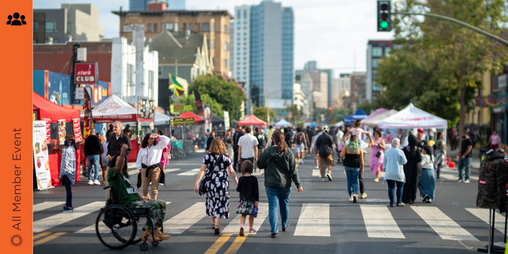 Image of pedestrians walking around First Fridays in Oakland