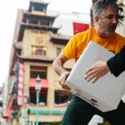 man lifting box