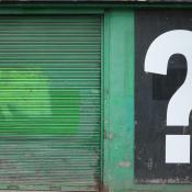 Question mark on a door