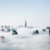 Skycrapers poking through the clouds