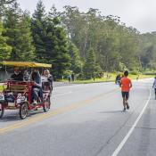 folks riding on JFK drive