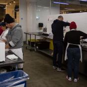 People cooking in a food incubator kitchen