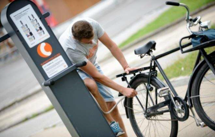 A public bike tire pump along a bicycle superhighway route. 