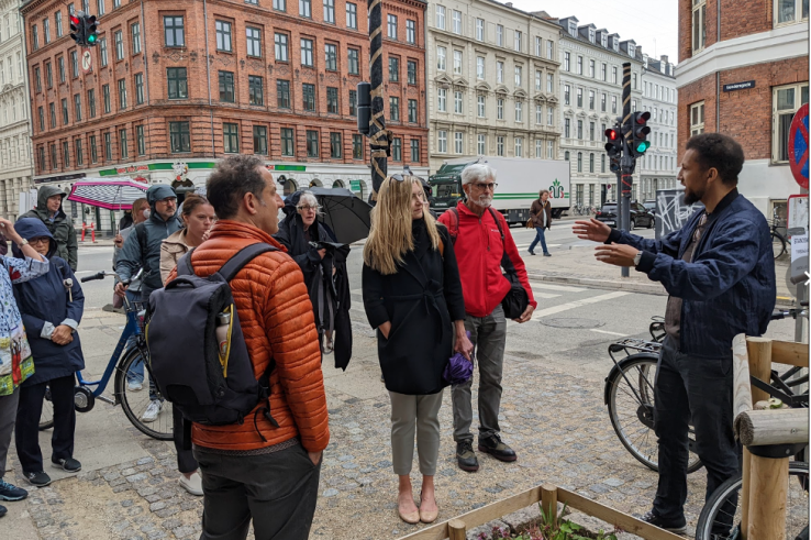 Councilmember Marcus Vesterager walks the group through Copenhagen’s neighborhoods. 
