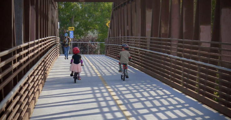 Trail used by commuters and families in Guadalupe River Park. Photo by the Guadalupe River Park Conservancy.