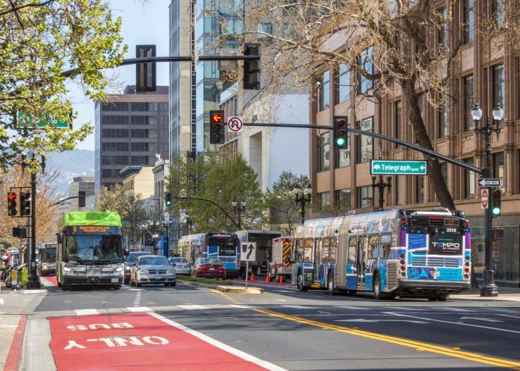 buses on a street in Oakland