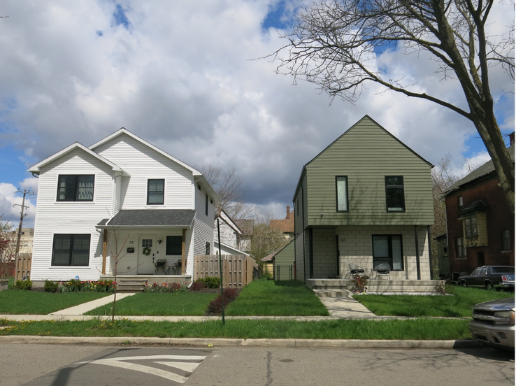 Develop Detroit built the house on the right. Its investment in Detroit’s North End spurred other developers, including the one responsible for the house on the left, to become interested in the neighborhood.