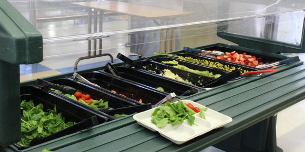 A salad bar at a school cafeteria