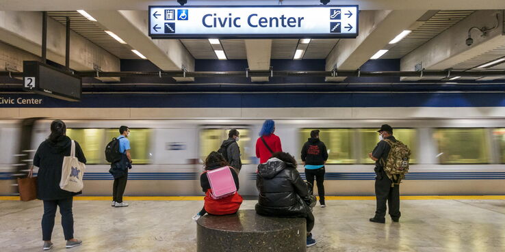 people waiting for the train at Civic Center BART station