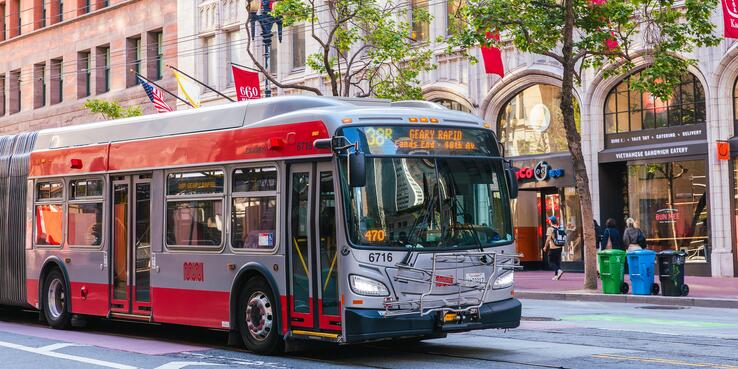 a Muni bus driving on Geary Boulevard