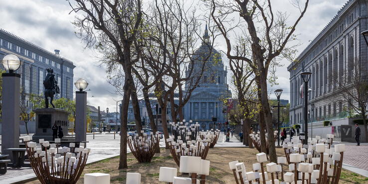Photo of art installation with San Francisco City Hall in the background