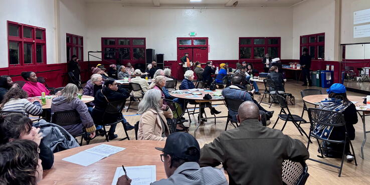 Oaklanders attending a discussion of charter reform