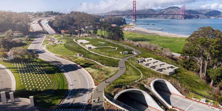 Computer generated overhead rendering of Battery Bluff. Includes blue, cloudy skies, greenery surrounding the park and streets, the Golden Gate Bridge, and the Bay.