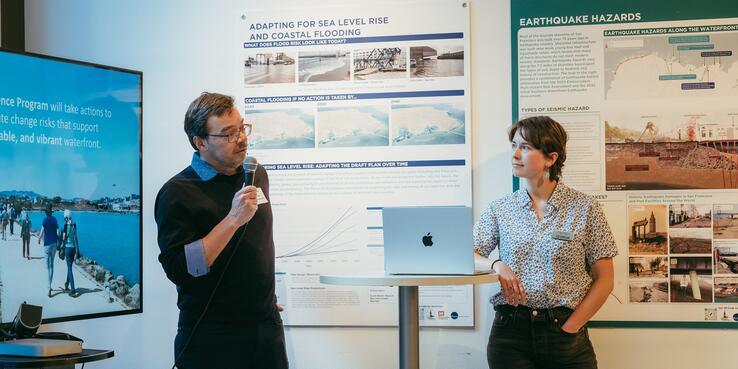 Photo of Luiz Barata of the Port of San Francisco and SPUR’s Sarah Atkinson presenting an interactive exhibit
