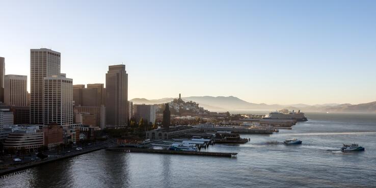Photo of downtown San Francisco high rises, piers and Bay shoreline
