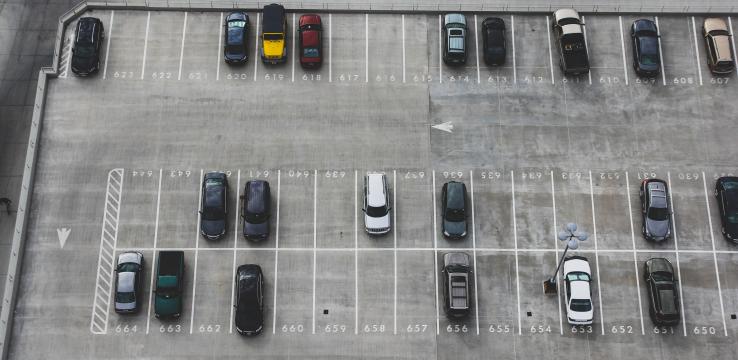 photo of a mostly empty parking lot