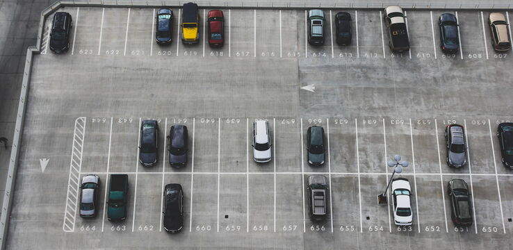 photo of a mostly empty parking lot