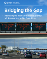 cars approaching a toll plaza