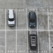 Arial View of Cars Parked on Parking Lot by John Matuchuk on Unsplash