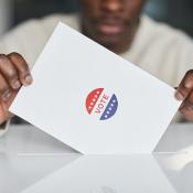 Person Putting a Paper in White Ballot Box Photo by Edmond Dantès on Pexels
